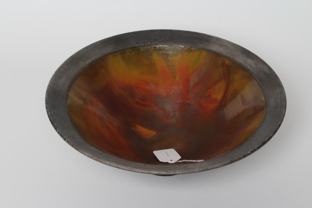 ANDREW HILL (b.1964) - a raku stoneware pedestal conical bowl with mottled red and copper glaze Image