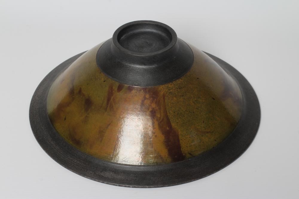 ANDREW HILL (b.1964) - a raku stoneware pedestal conical bowl with mottled red and copper glaze Image