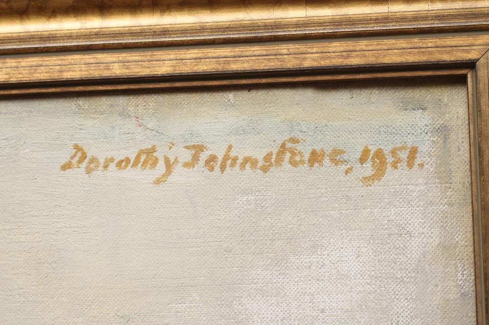 DOROTHY JOHNSTONE (1892-1980) Portrait of a Young Girl seated on an armchair holding a doll Image