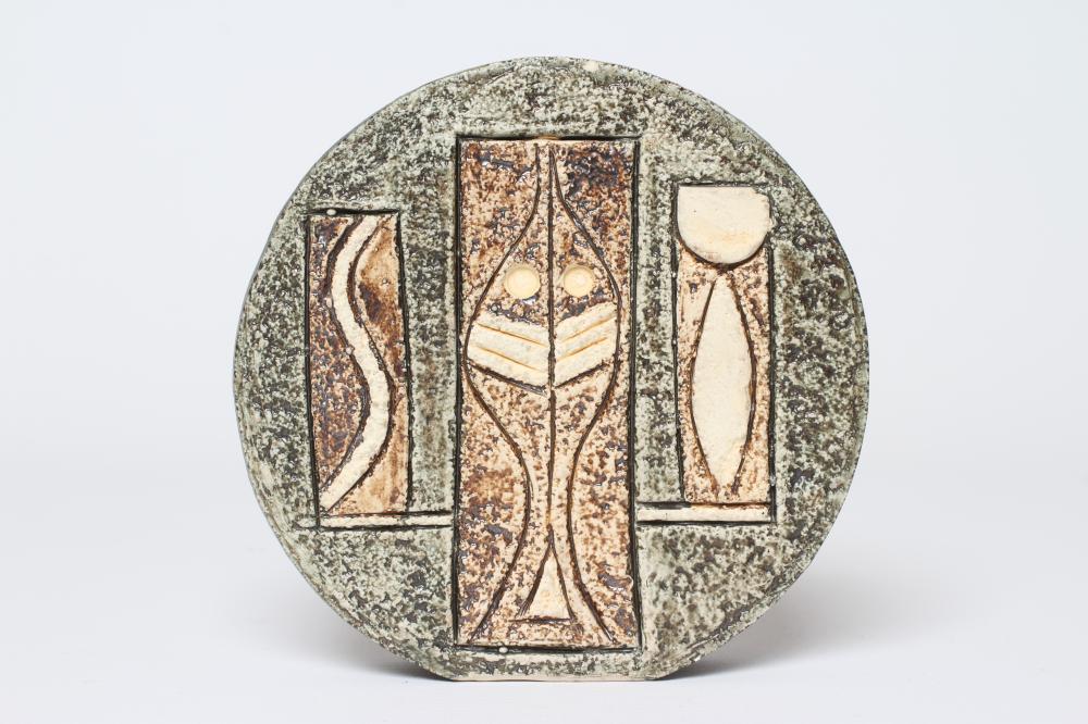 A TROIKA POTTERY SMALL WHEEL VASE with typical incised panels of a portcullis and fish in shades of Image