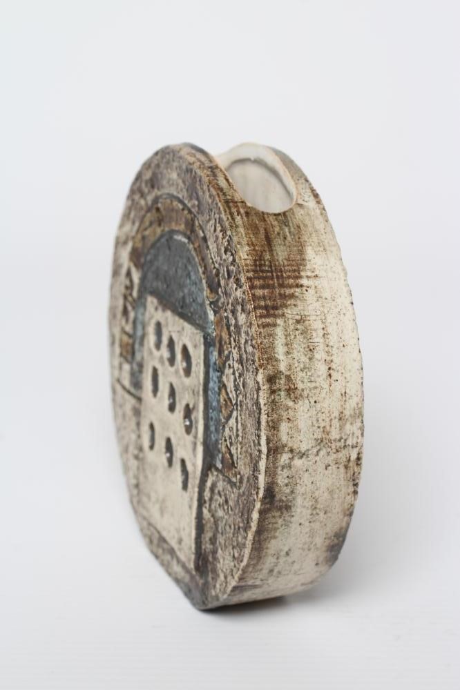 A TROIKA POTTERY SMALL WHEEL VASE with typical incised panels in shades of blue, grey and brown by Image