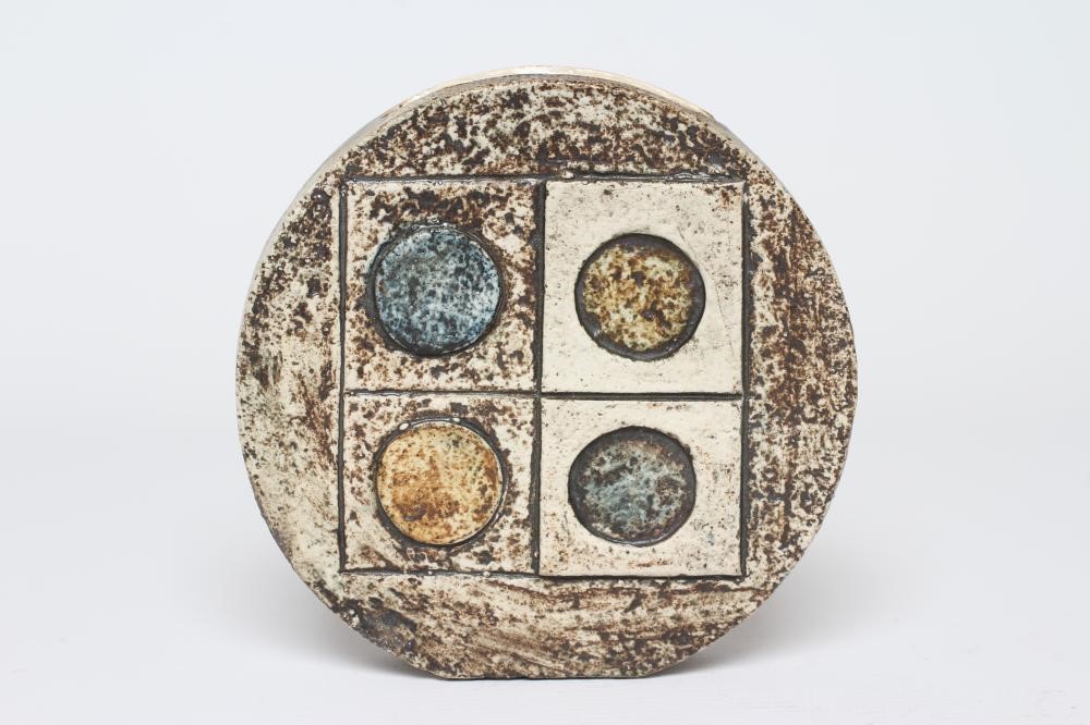 A TROIKA POTTERY SMALL WHEEL VASE with typical incised panels in shades of blue, grey and brown by Image