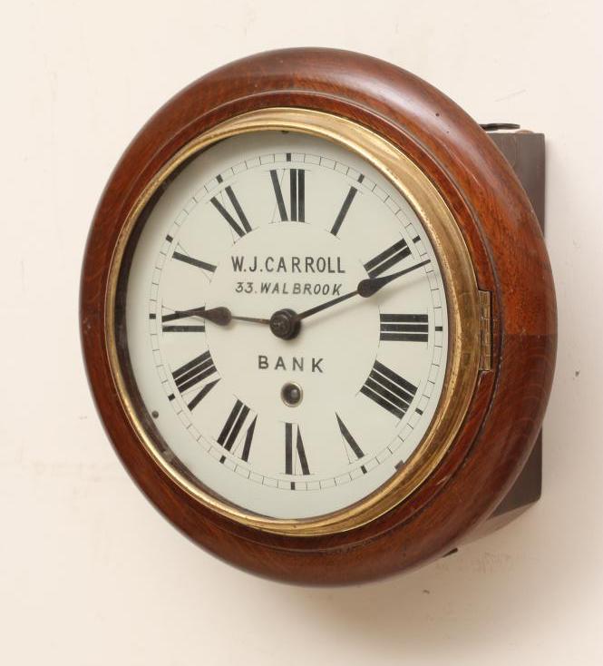 AN OAK WALL DIAL TIMEPIECE BY W J CARROLL Image