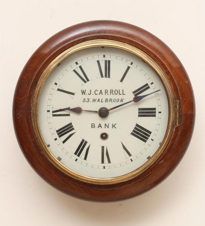 AN OAK WALL DIAL TIMEPIECE BY W J CARROLL Image
