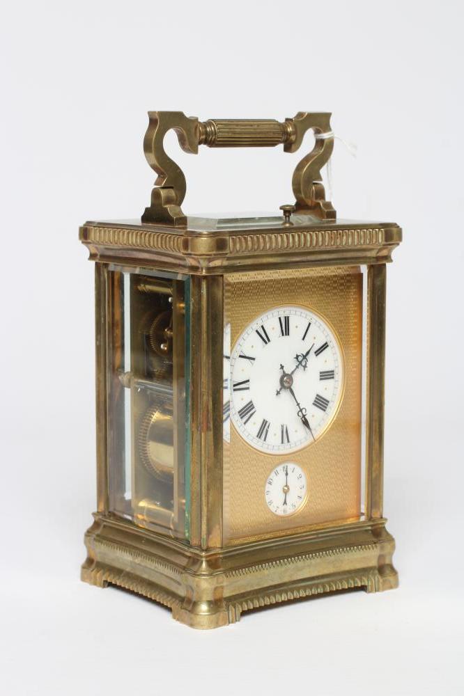 A BRASS CARRIAGE CLOCK Image
