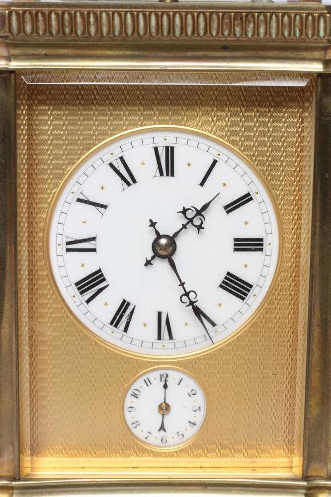 A BRASS CARRIAGE CLOCK Image