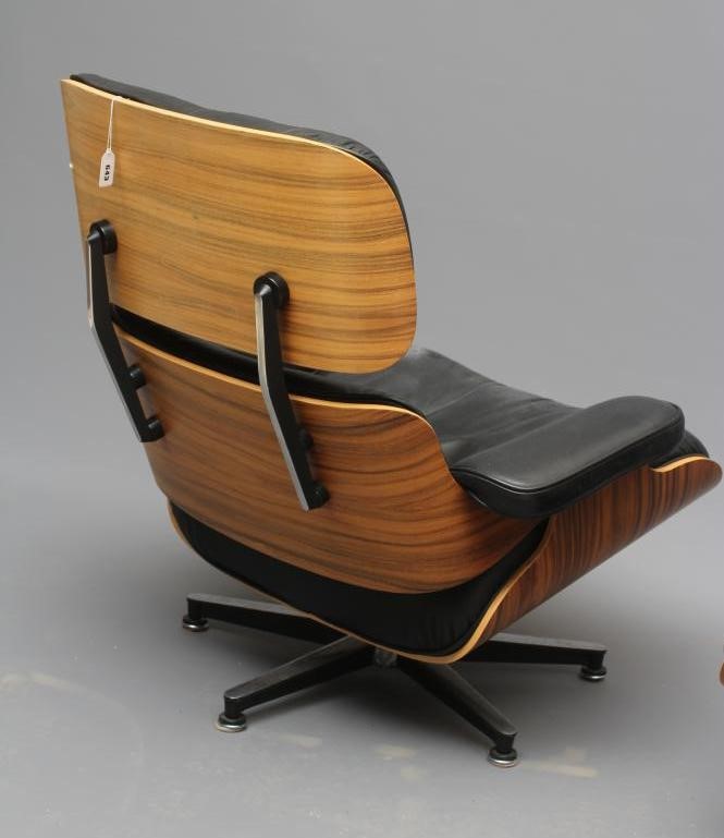 AFTER CHARLES AND RAY EAMES - A LOUNGE CHAIR '670' AND OTTOMAN '671' Image