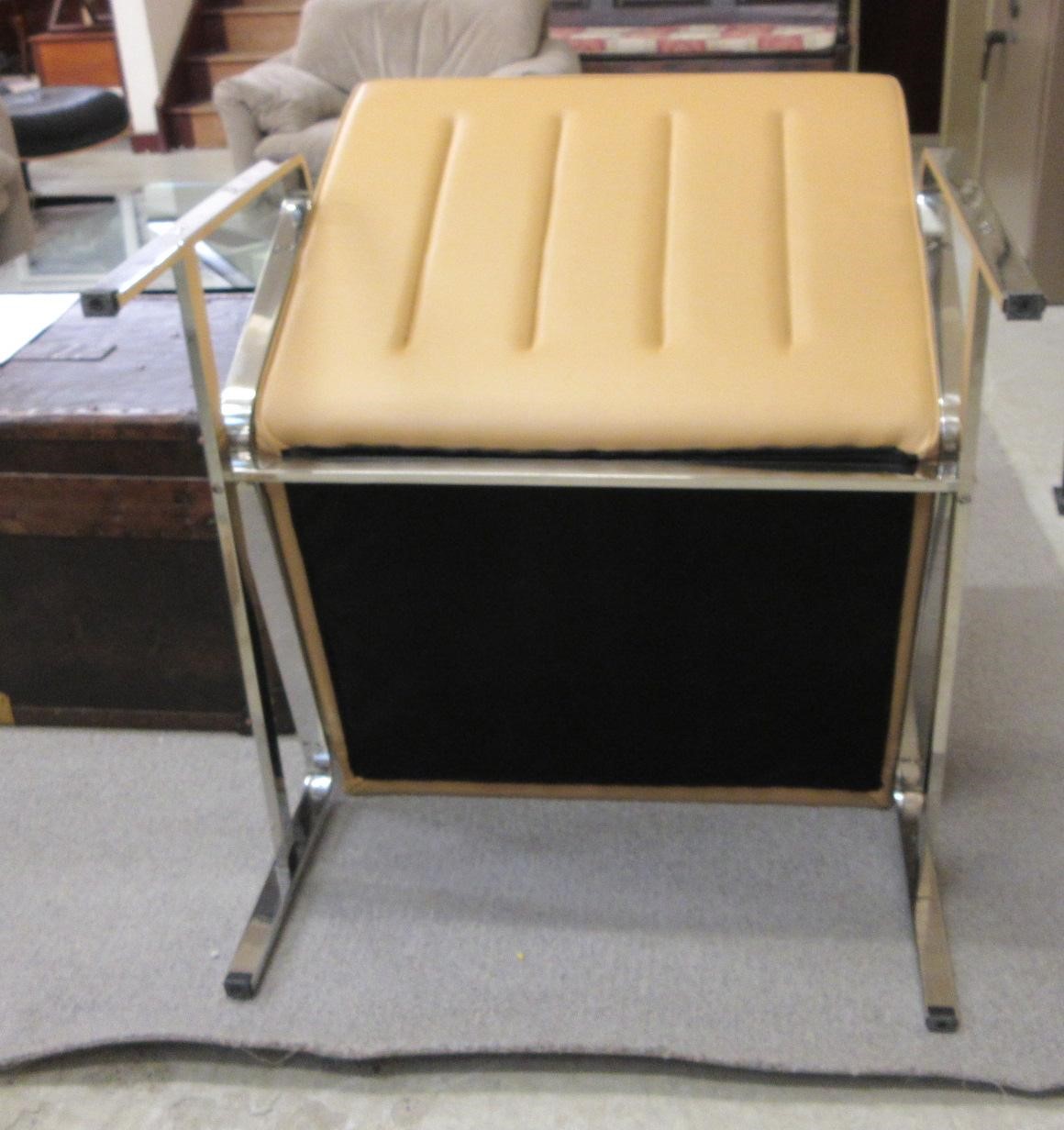 A PAIR OF LEATHER AND CHROME FRAMED ARMCHAIRS Image