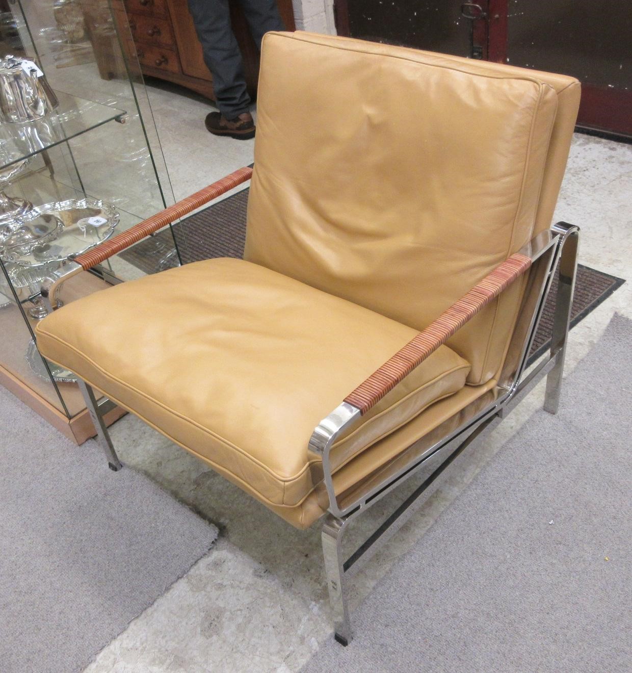A PAIR OF LEATHER AND CHROME FRAMED ARMCHAIRS Image