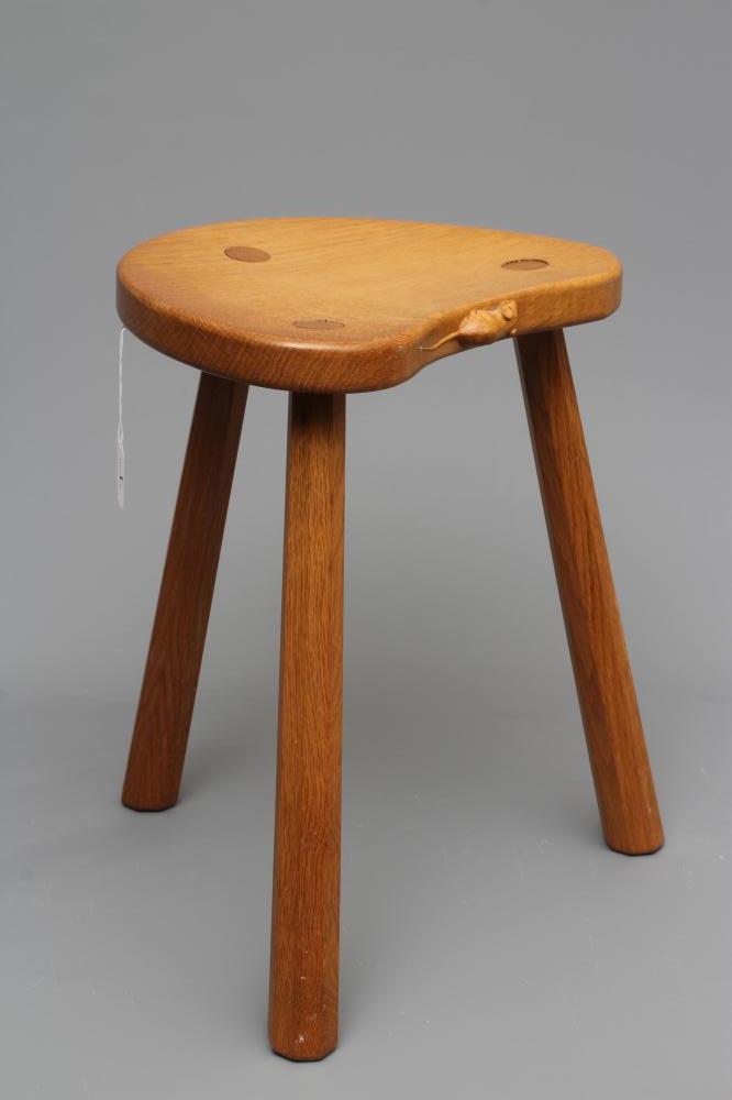 A ROBERT THOMPSON ADZED OAK COW STOOL Image