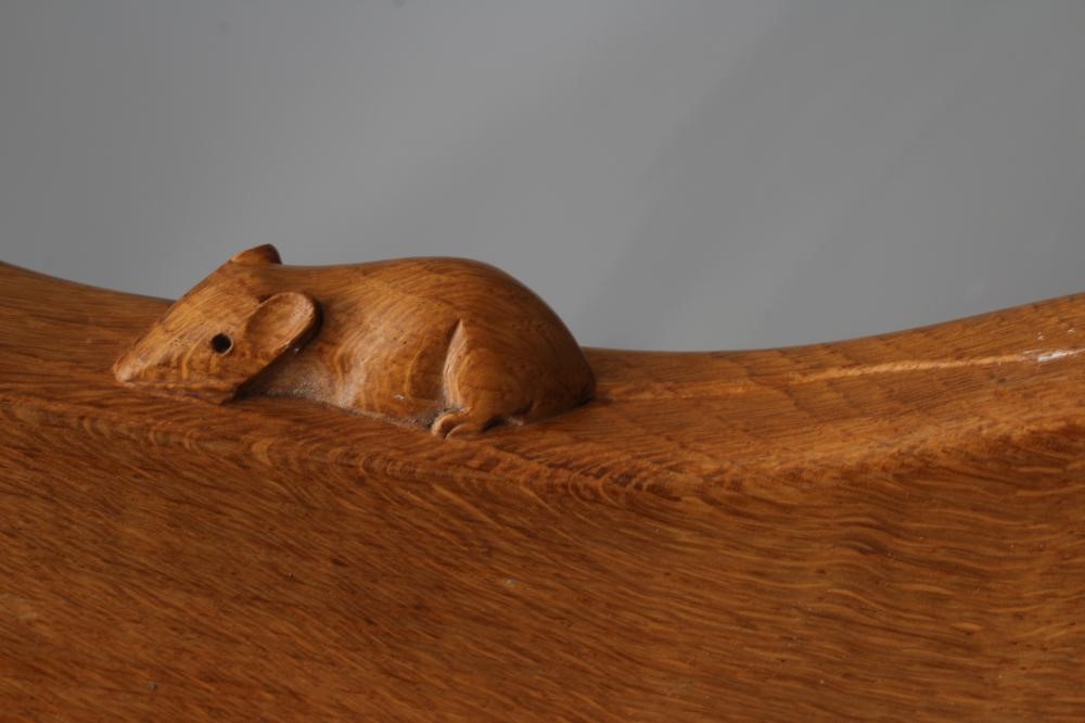 A ROBERT THOMPSON ADZED OAK COW STOOL Image