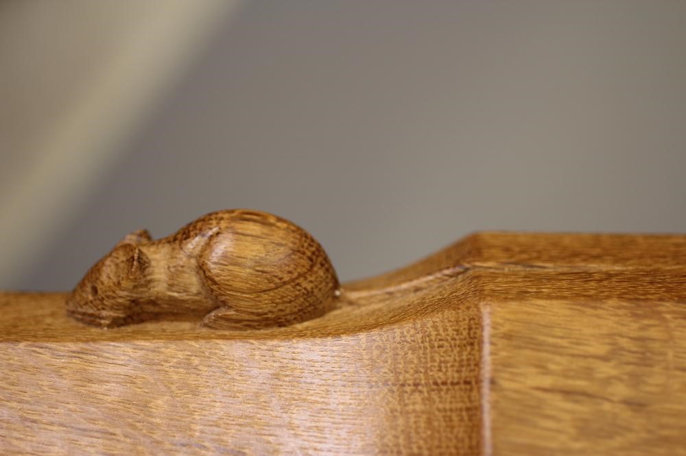 A ROBERT THOMPSON ADZED OAK DINING TABLE Image