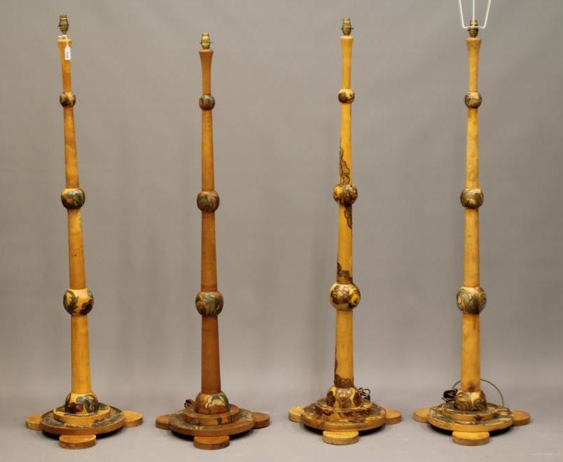 A SET OF FOUR ART DECO LIGHT BEECH STANDARD LAMPS BY CYRIL M ROYLE painted with flowers and foliage Image