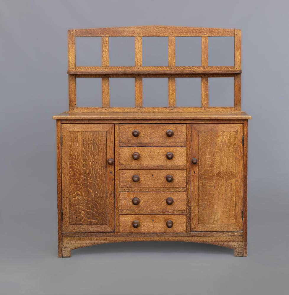 A SMALL HEALS STYLE ARTS AND CRAFTS SIDEBOARD Image