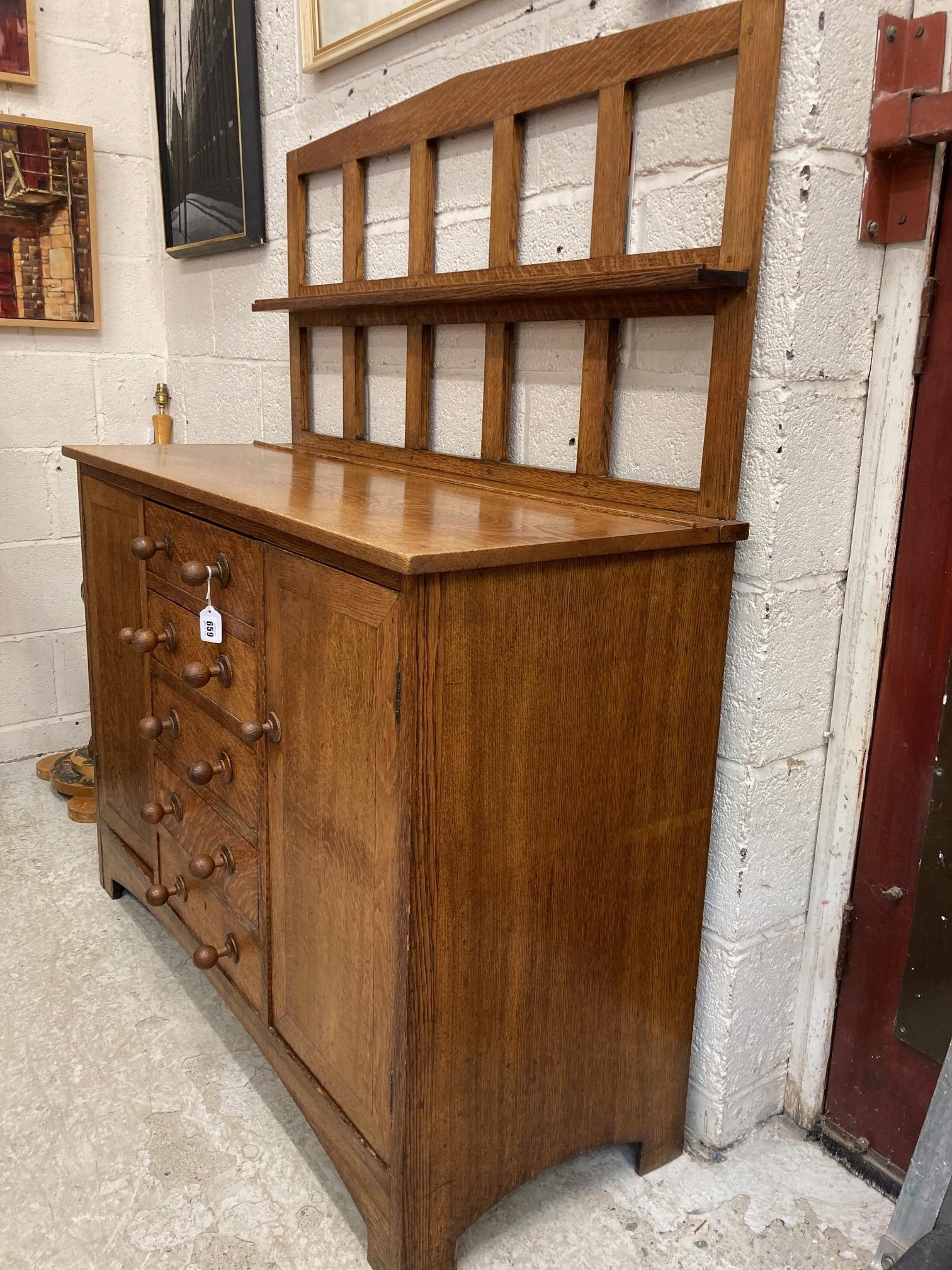 A SMALL HEALS STYLE ARTS AND CRAFTS SIDEBOARD Image