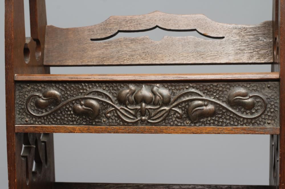 AN ARTS AND CRAFTS OAK BOOKSTAND Image