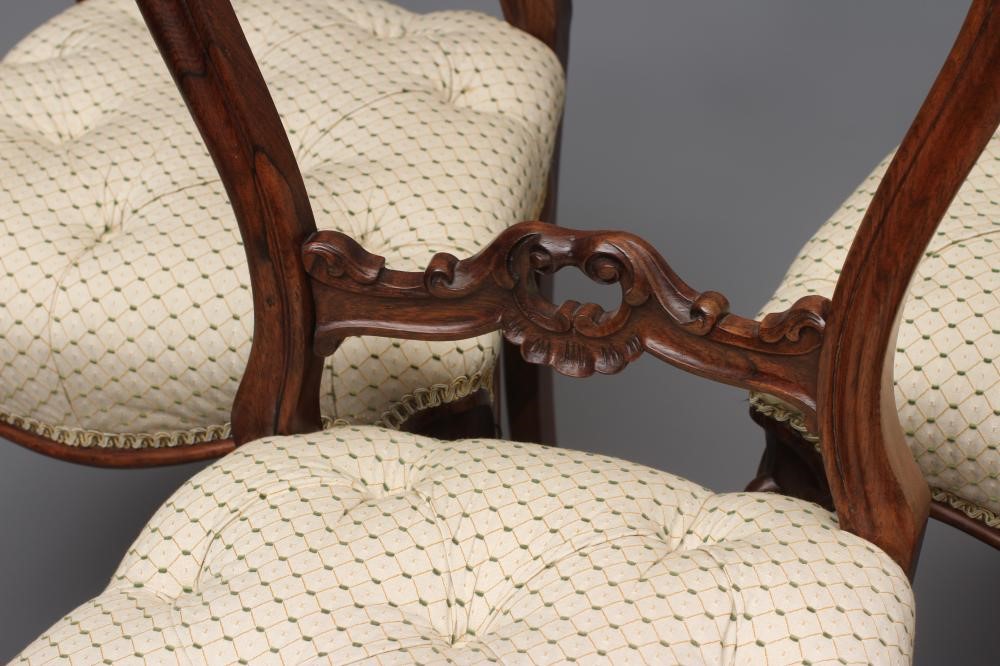 A SET OF SIX VICTORIAN ROSEWOOD DINING CHAIRS button upholstered in a cream and green weave Image