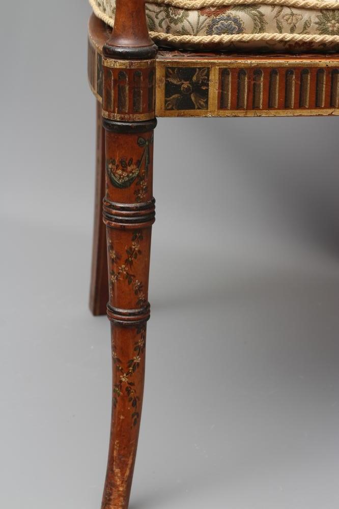 AN EDWARDIAN CANED AND FLORAL PAINTED ELBOW CHAIR Image