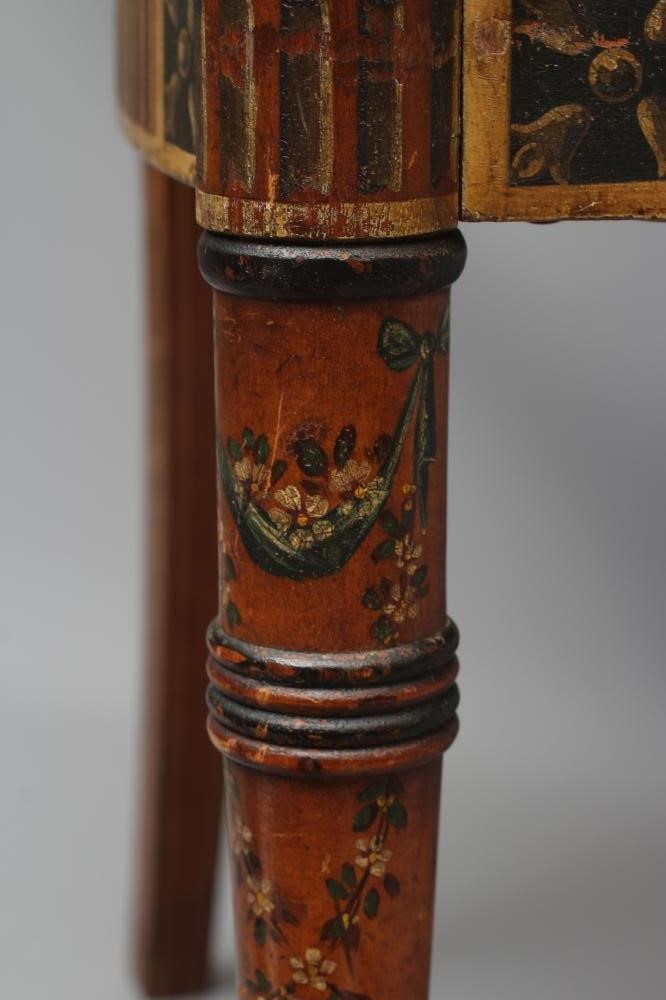 AN EDWARDIAN CANED AND FLORAL PAINTED ELBOW CHAIR Image