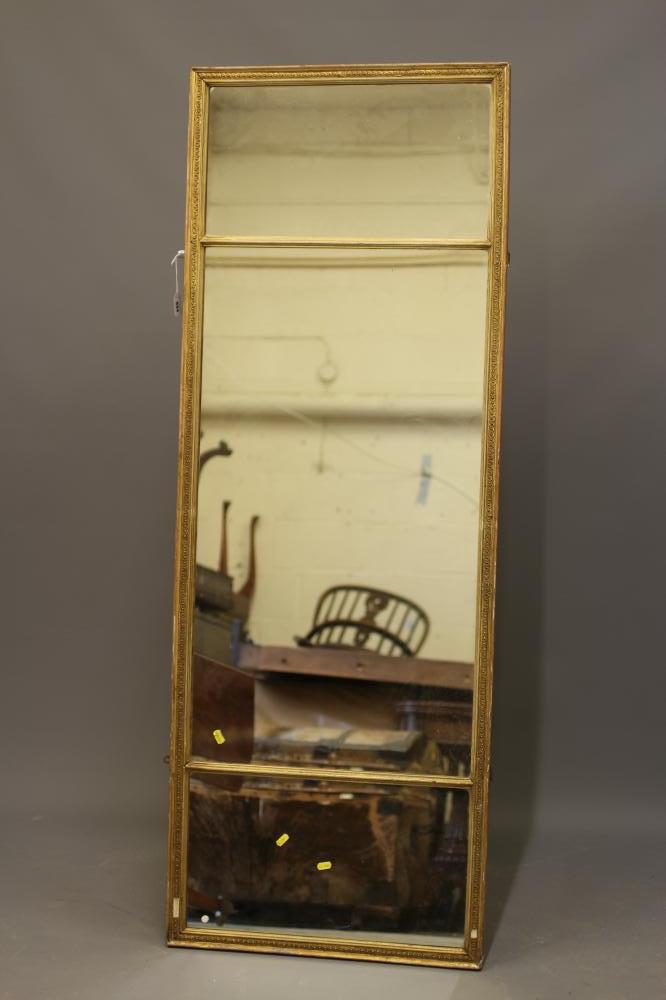 AN EDWARDIAN TRIPLE PLATE GILDED WALL MIRROR, the oblong plates within a chain link moulded gilt Image