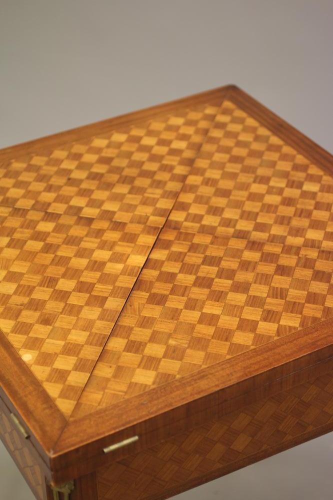 A LOUIS XVI STYLE MAHOGANY AND PARQUETRY ENVELOPE CARD TABLE Image