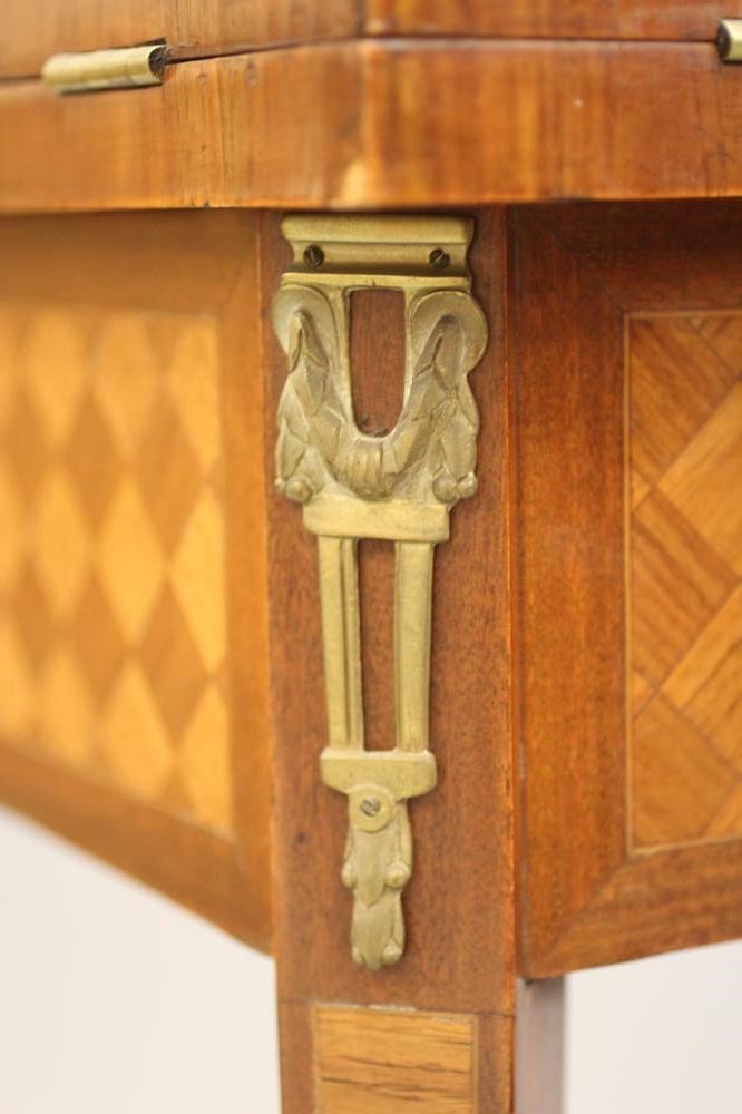 A LOUIS XVI STYLE MAHOGANY AND PARQUETRY ENVELOPE CARD TABLE Image