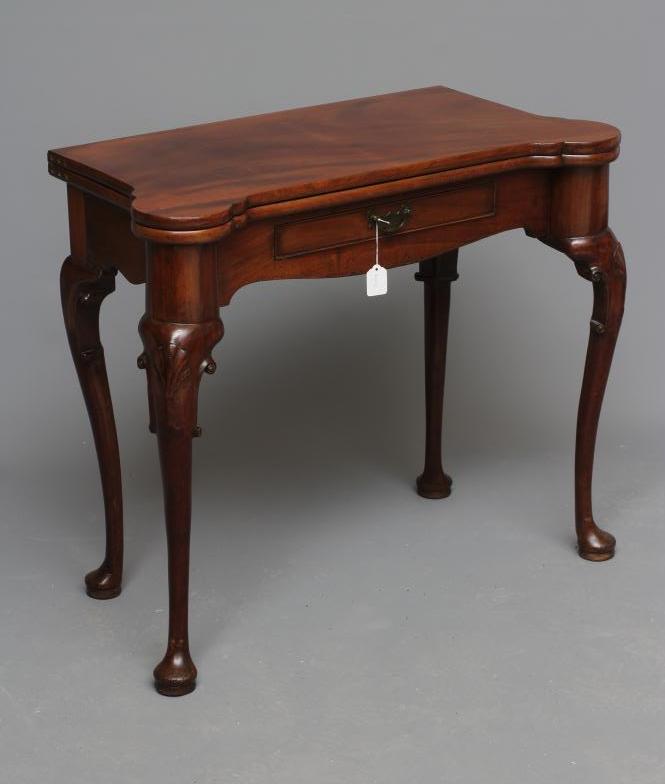 A GEORGE II DESIGN MAHOGANY FOLDING TEA TABLE Image