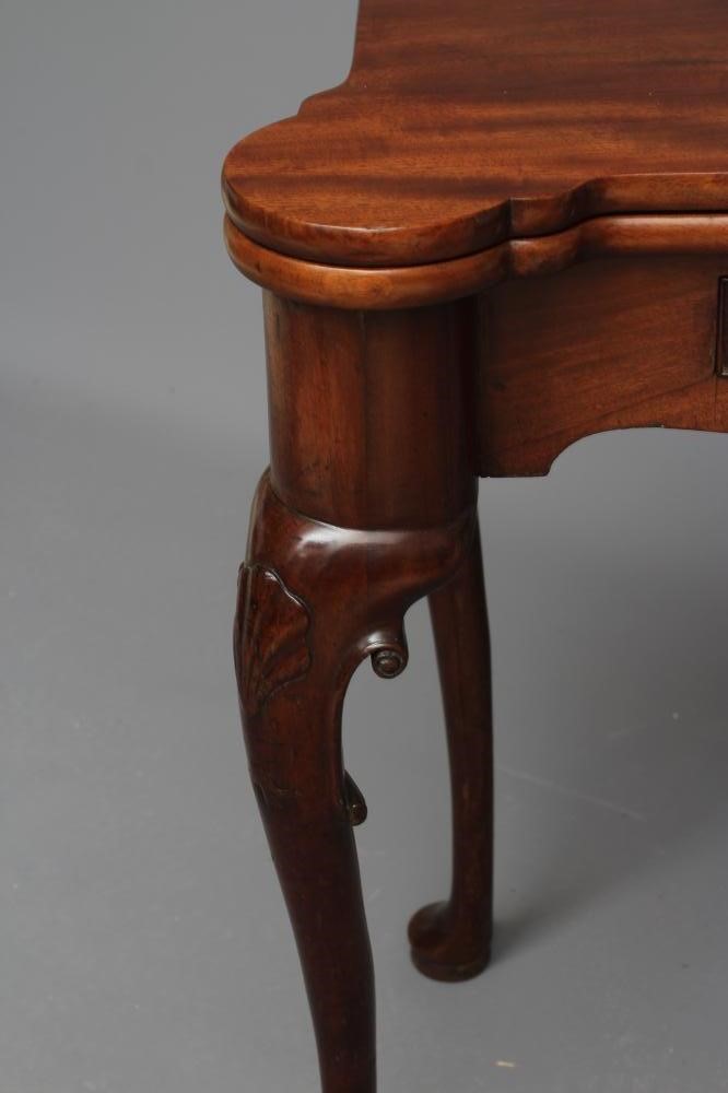 A GEORGE II DESIGN MAHOGANY FOLDING TEA TABLE Image