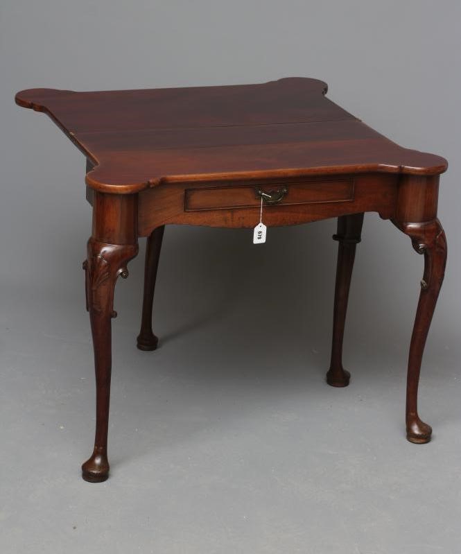 A GEORGE II DESIGN MAHOGANY FOLDING TEA TABLE Image