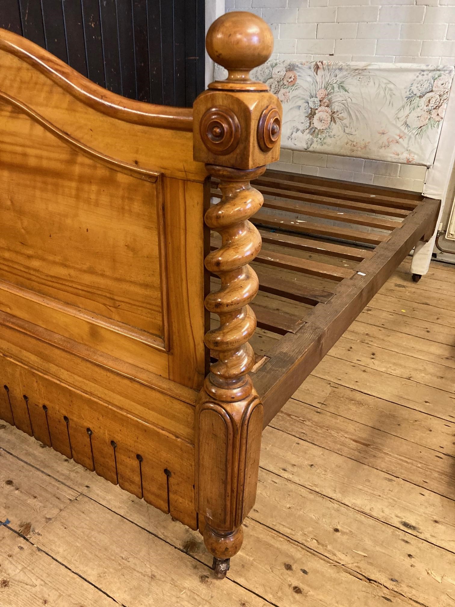 A VICTORIAN SATINWOOD HALF TESTER BED Image