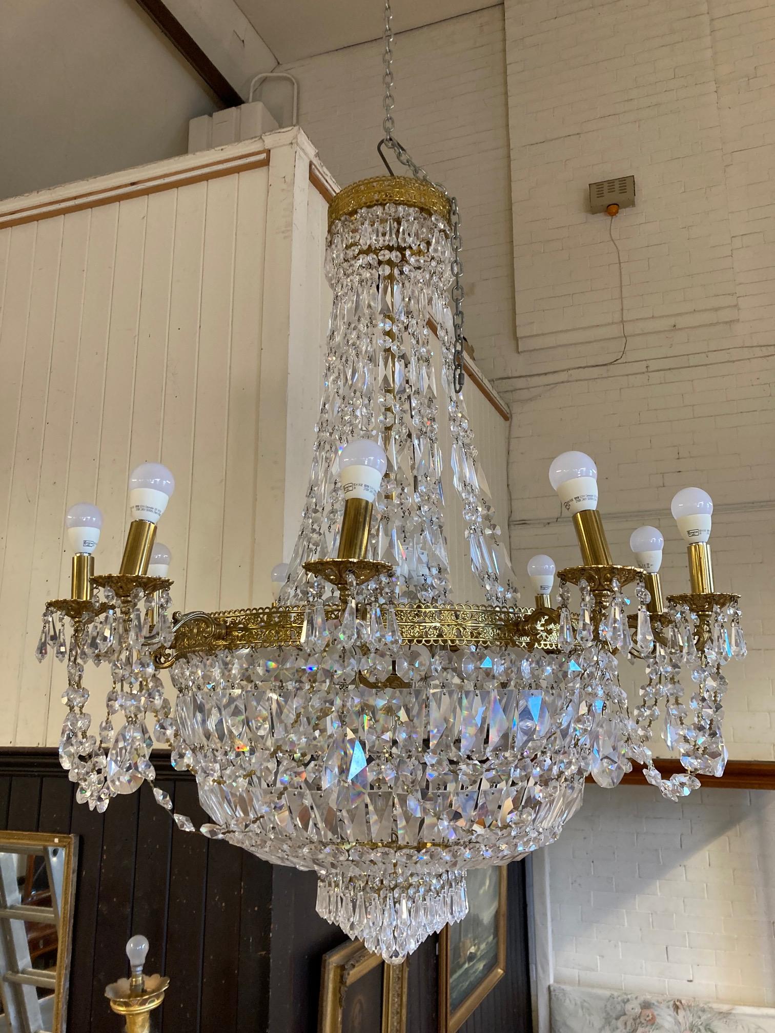 A PAIR OF CUT GLASS AND GILT METAL TEN LIGHT CHANDELIERS Image