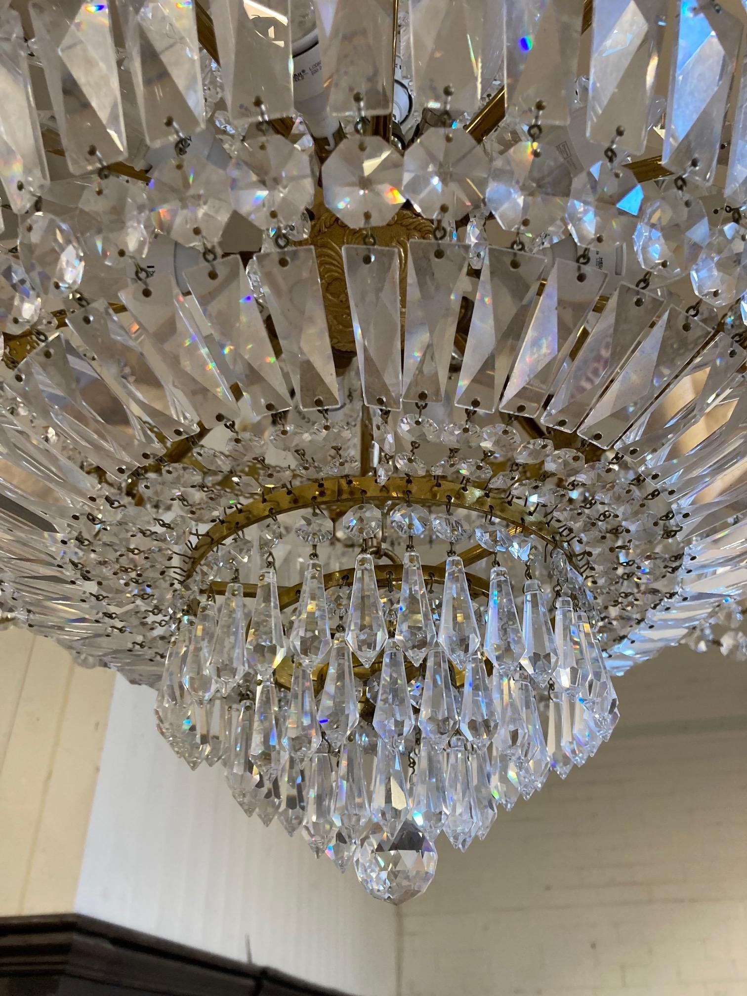 A PAIR OF CUT GLASS AND GILT METAL TEN LIGHT CHANDELIERS Image