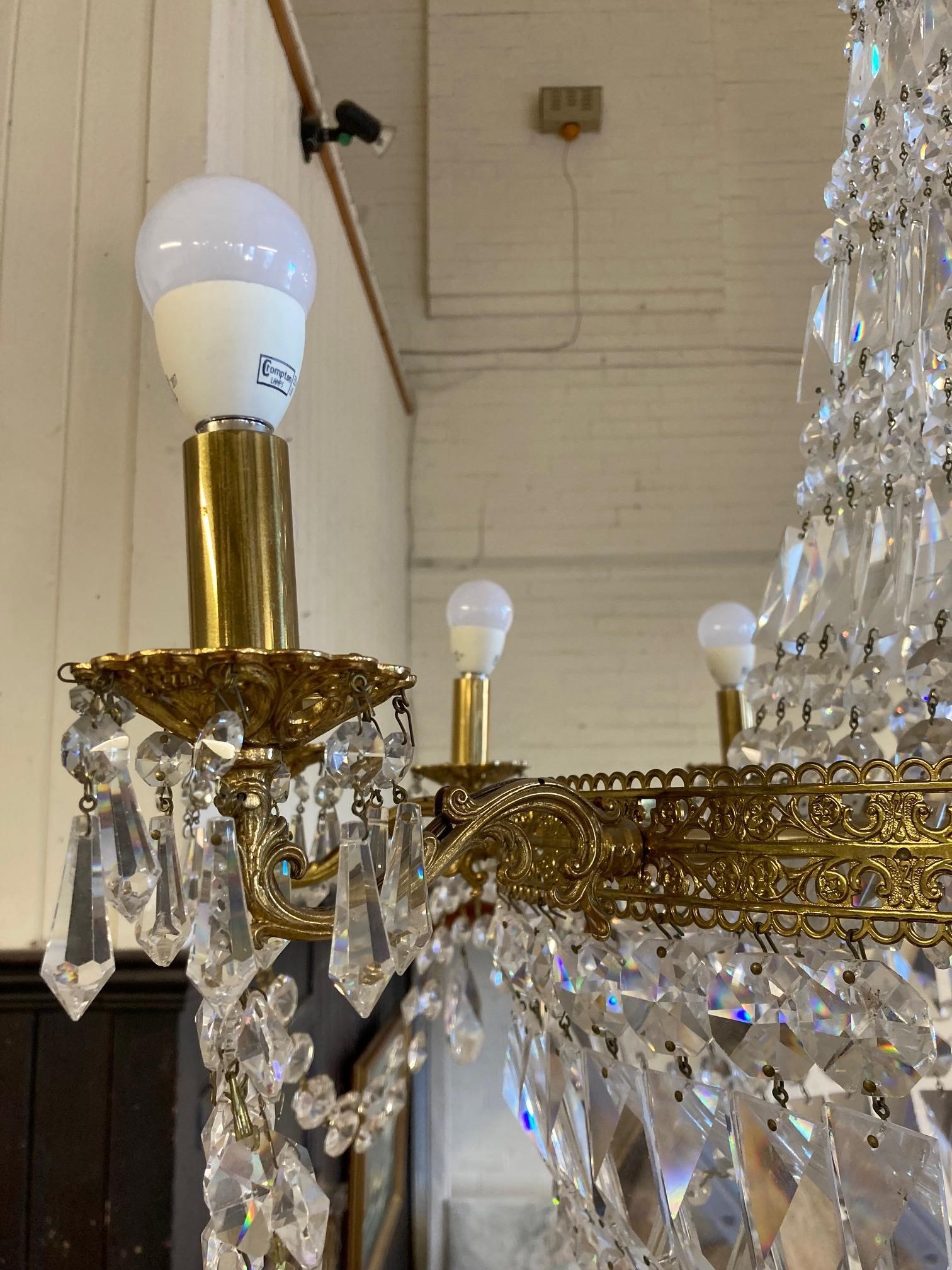 A PAIR OF CUT GLASS AND GILT METAL TEN LIGHT CHANDELIERS Image