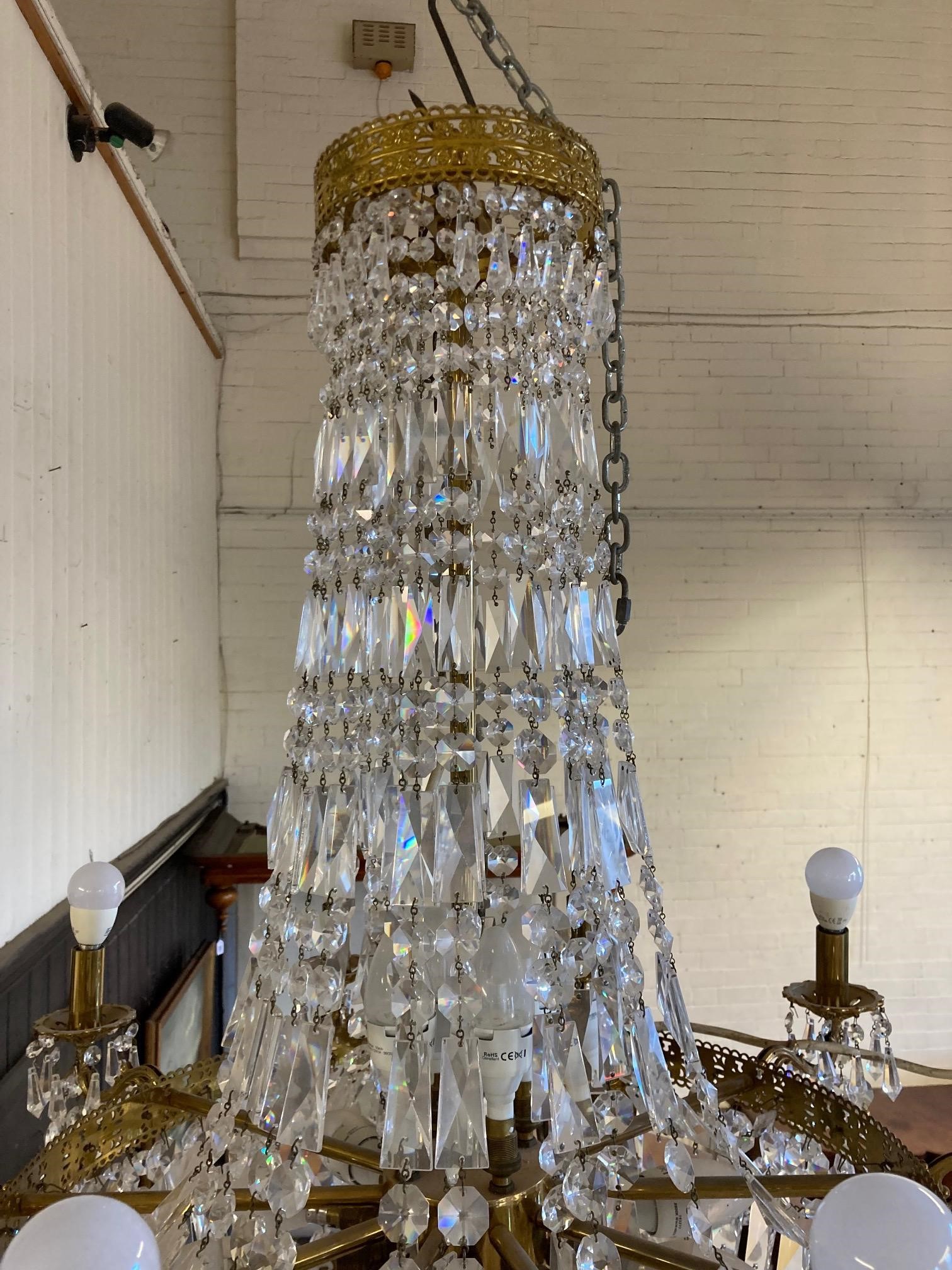A PAIR OF CUT GLASS AND GILT METAL TEN LIGHT CHANDELIERS Image