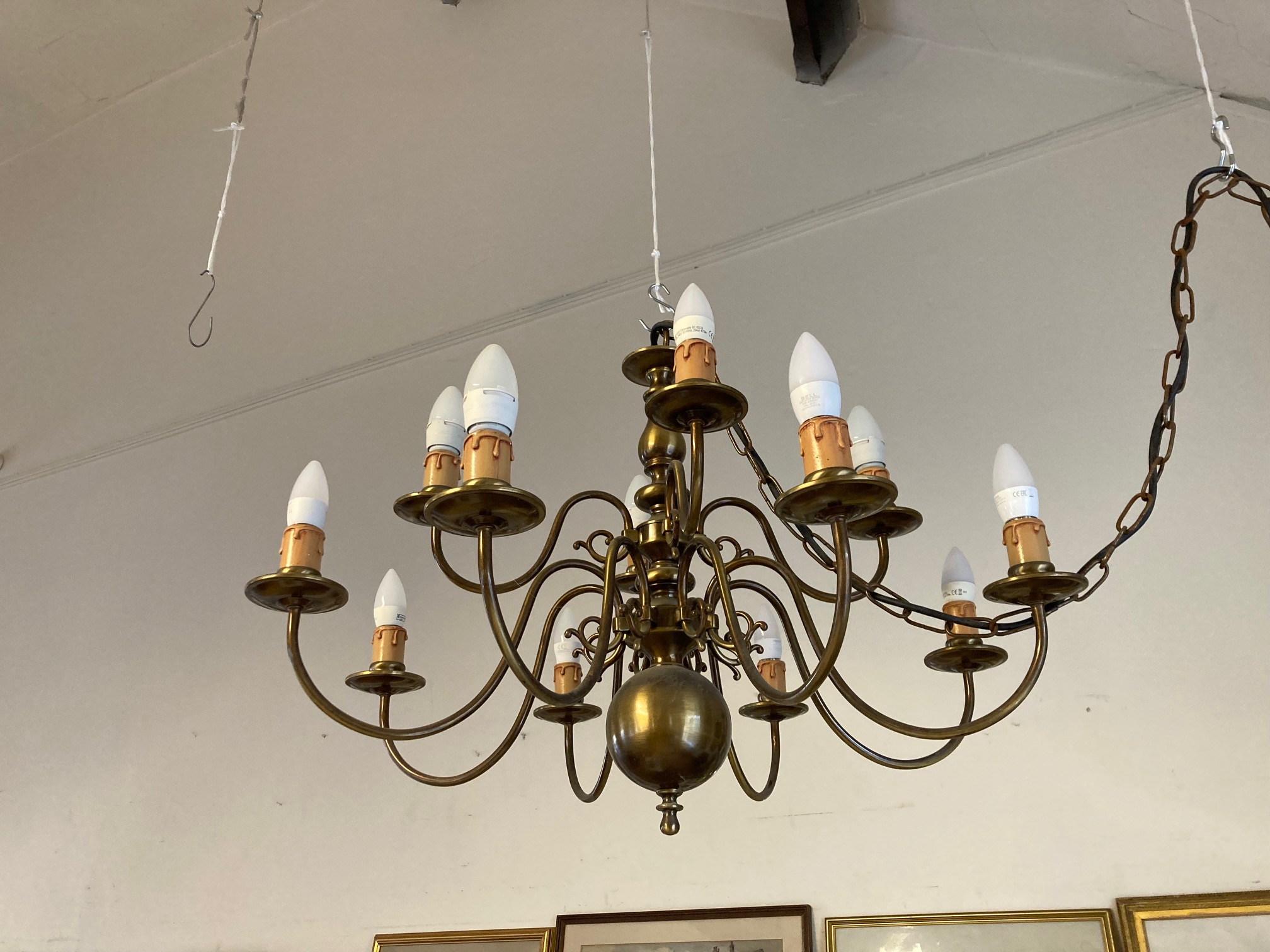 AN IMPRESSIVE BRASS DUTCH STYLE CHANDELIER Image
