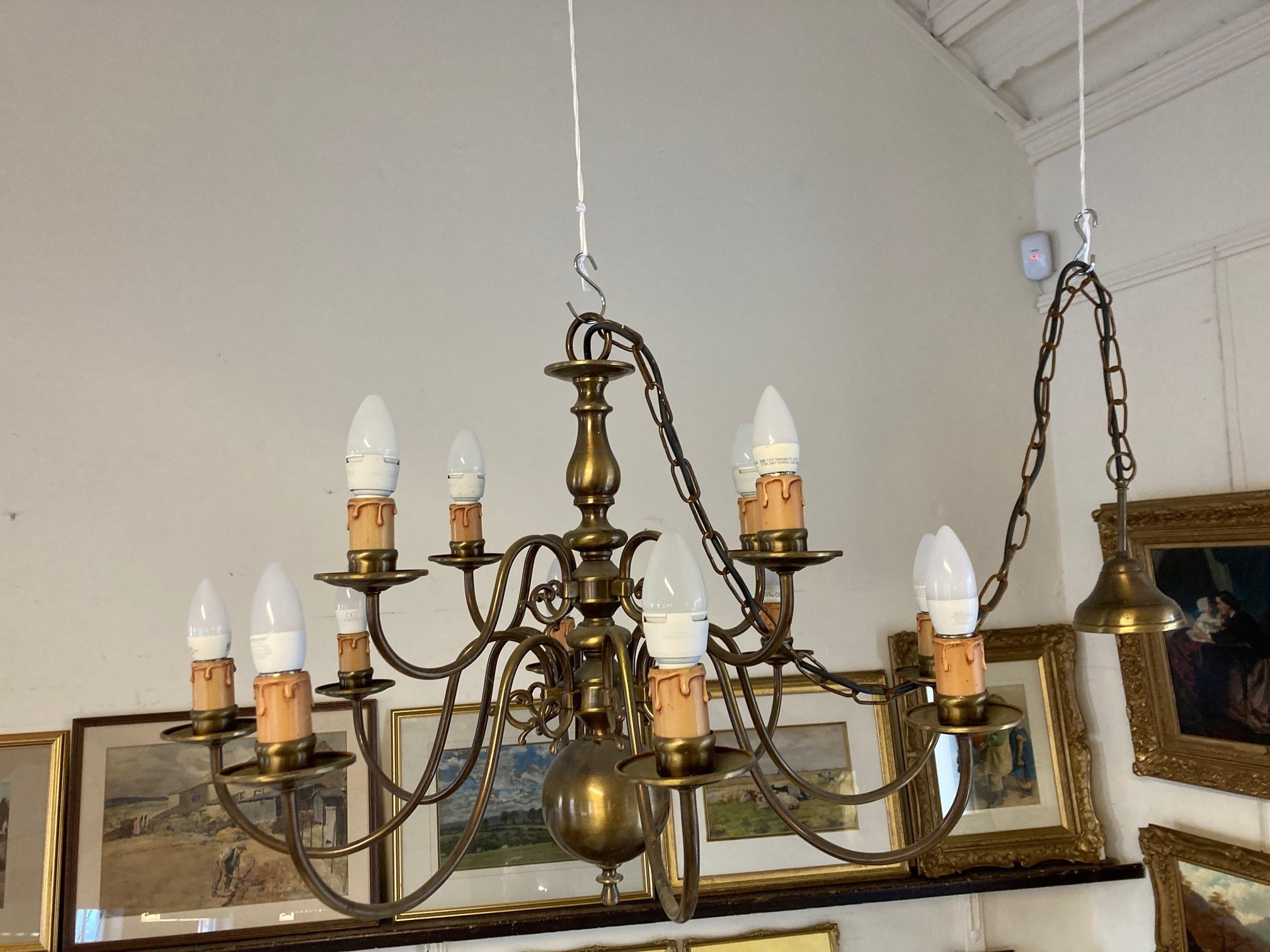 AN IMPRESSIVE BRASS DUTCH STYLE CHANDELIER Image