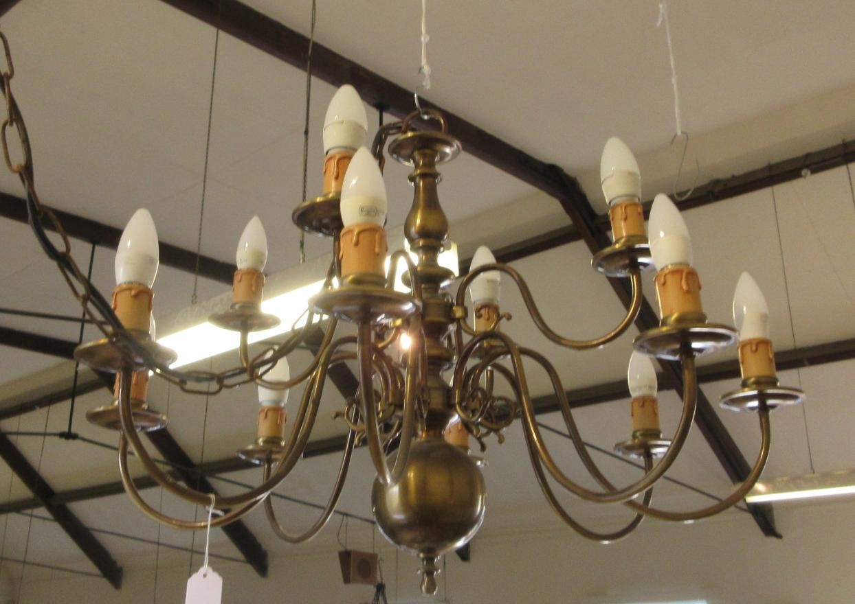 AN IMPRESSIVE BRASS DUTCH STYLE CHANDELIER Image