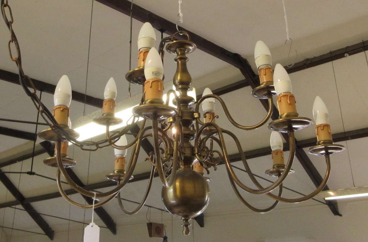 AN IMPRESSIVE BRASS DUTCH STYLE CHANDELIER Image