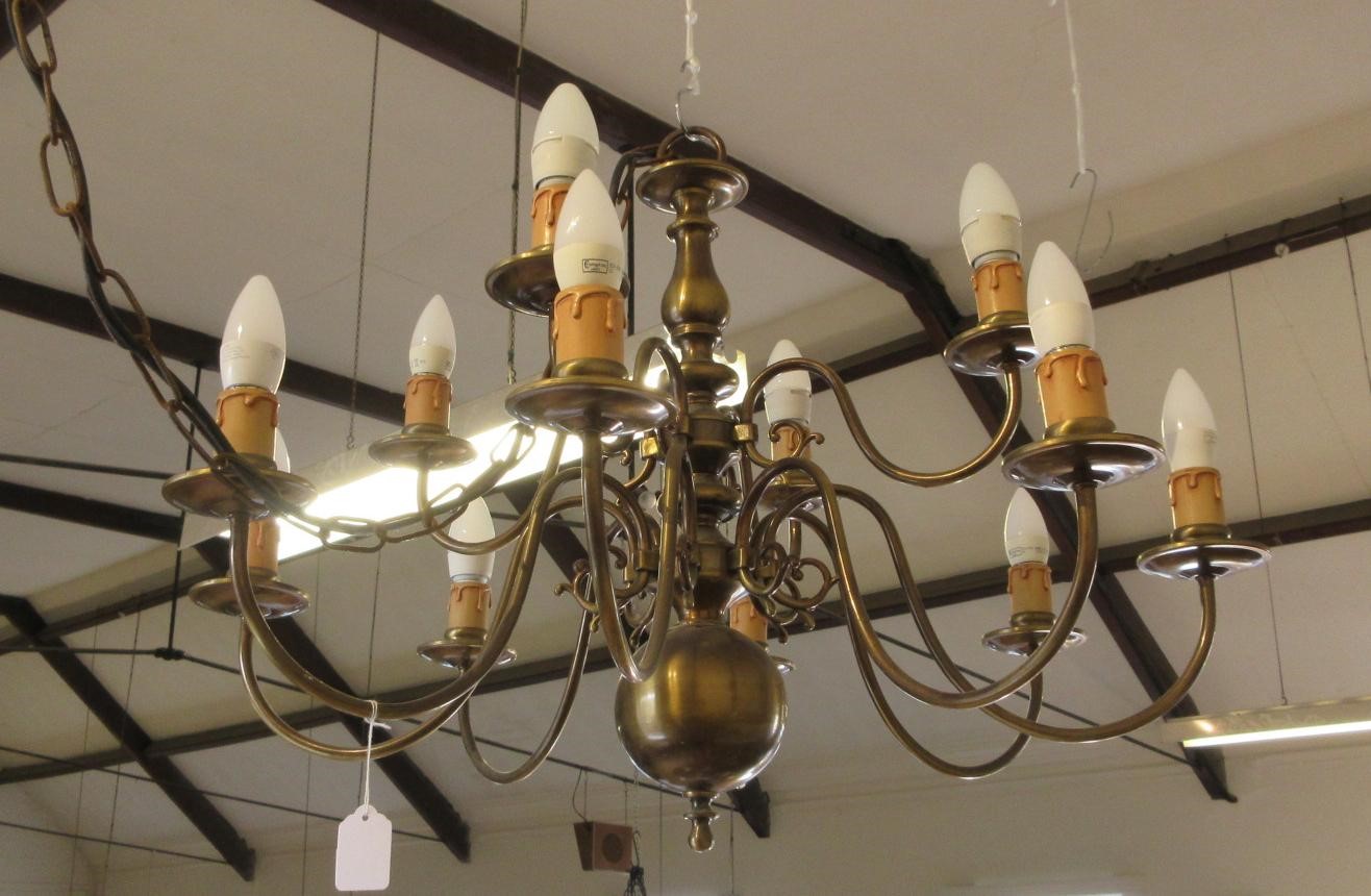 AN IMPRESSIVE BRASS DUTCH STYLE CHANDELIER Image