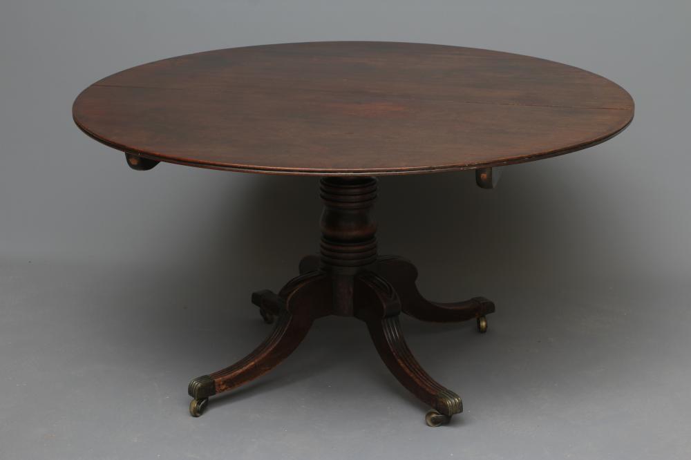 A REGENCY MAHOGANY BREAKFAST TABLE Image