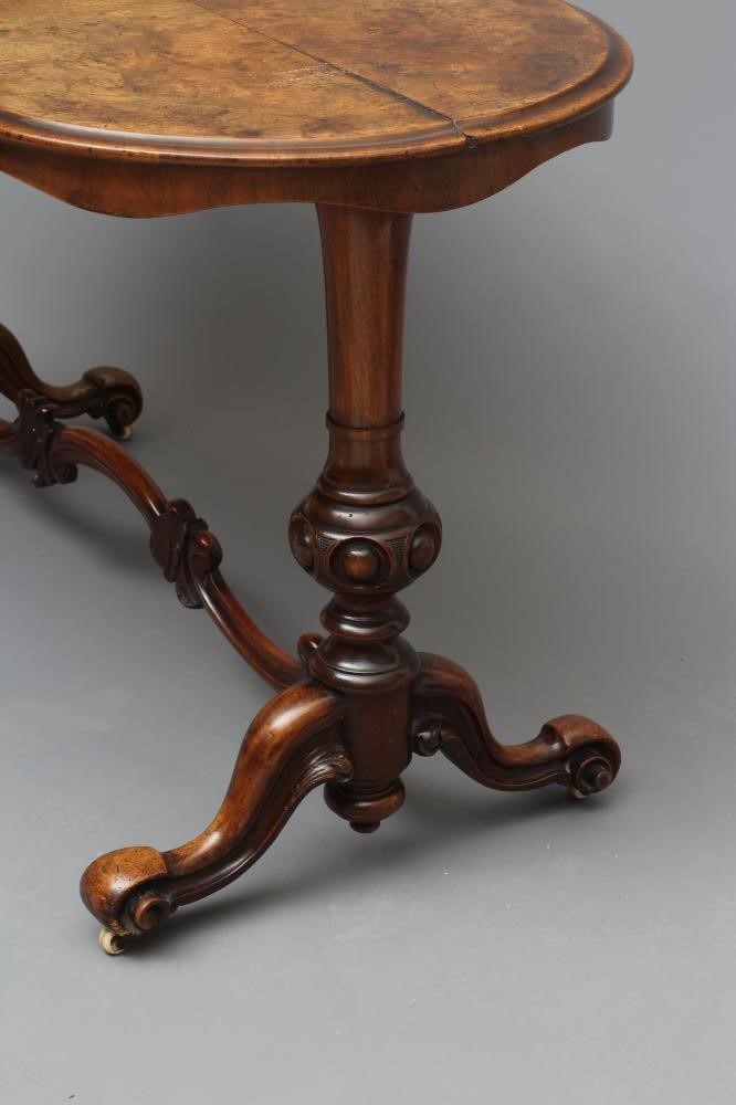 A VICTORIAN WALNUT PILLAR END CENTRE TABLE Image