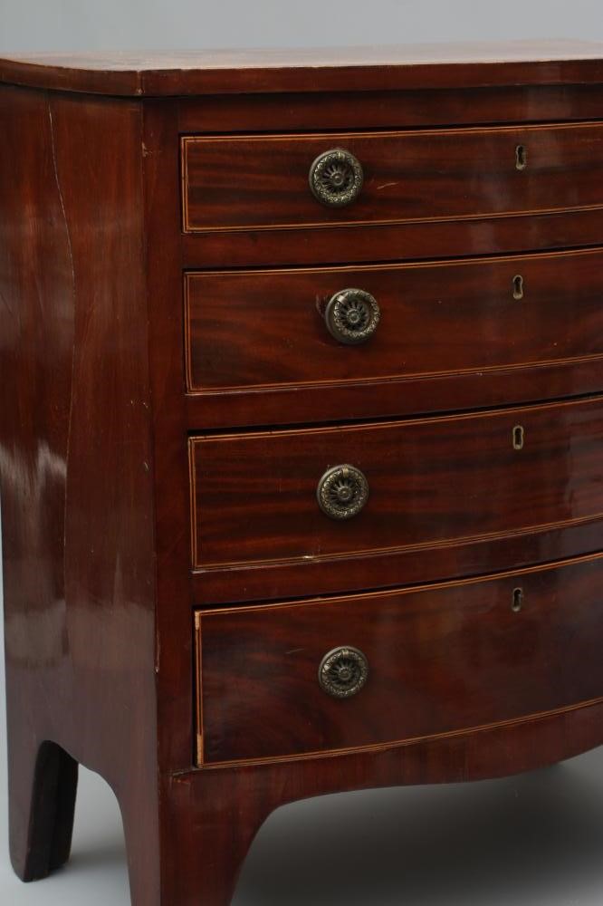 A SMALL BOWED MAHOGANY CHEST Image