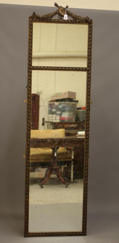 A GILT GESSO PIER GLASS, 19th century, the oblong plate in two divisions within a ribbon border and Image