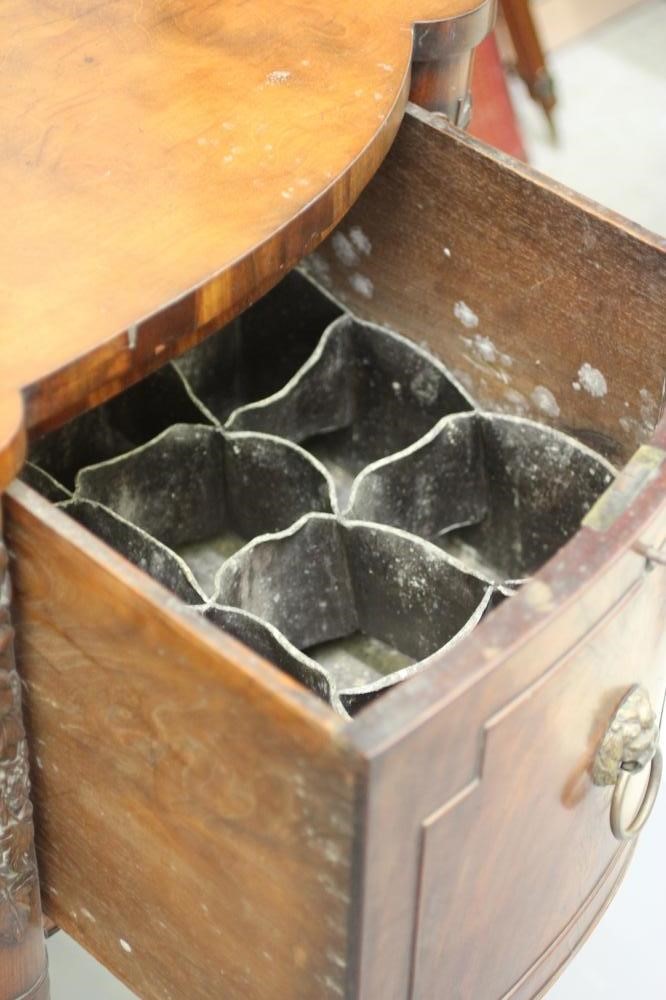 A REGENCY MAHOGANY BOWED SIDEBOARD Image