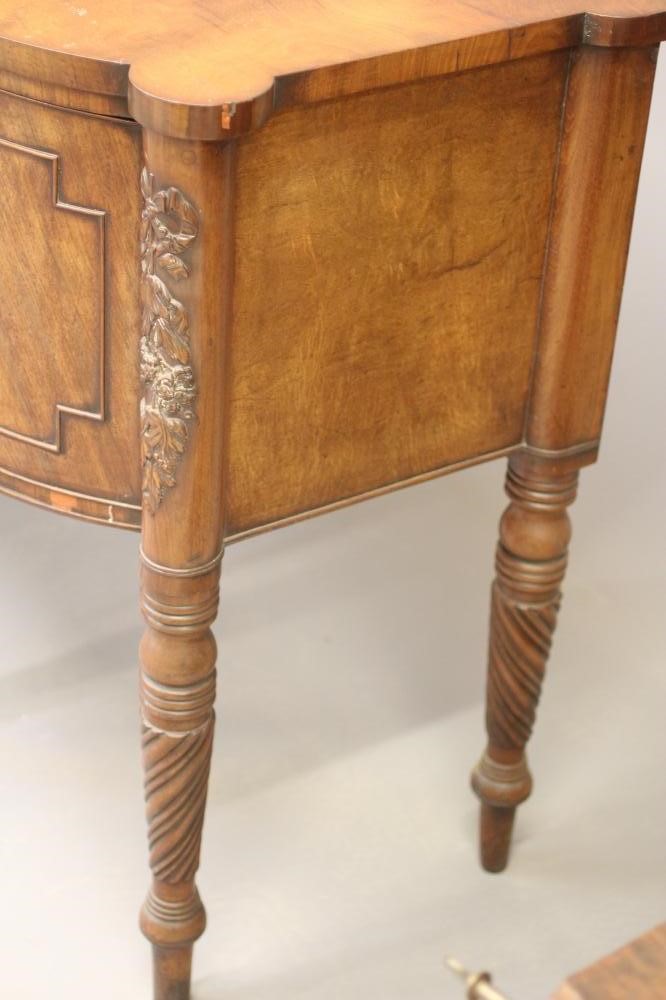 A REGENCY MAHOGANY BOWED SIDEBOARD Image