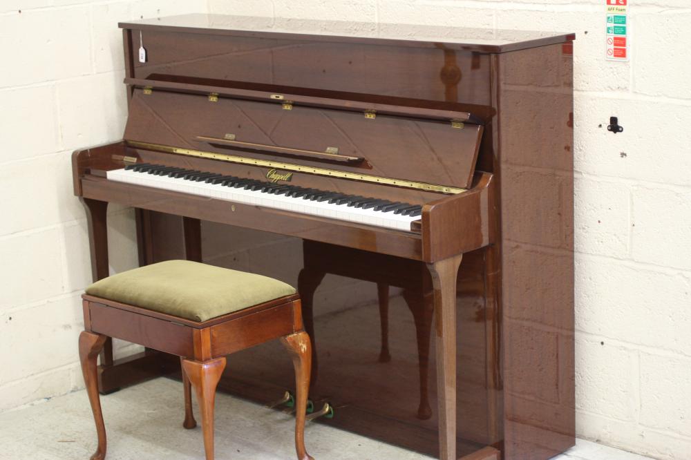AN UPRIGHT MAHOGANY CASED PIANO BY CHAPPELL Image