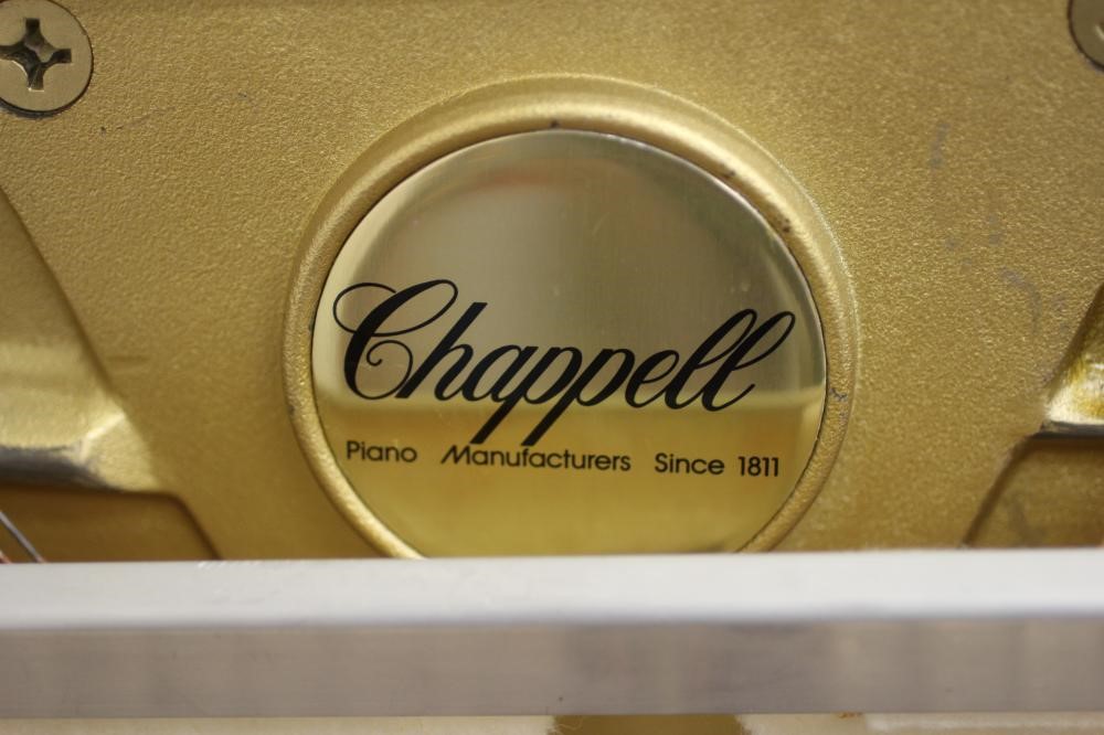 AN UPRIGHT MAHOGANY CASED PIANO BY CHAPPELL Image