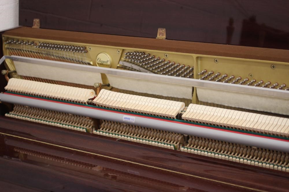AN UPRIGHT MAHOGANY CASED PIANO BY CHAPPELL Image