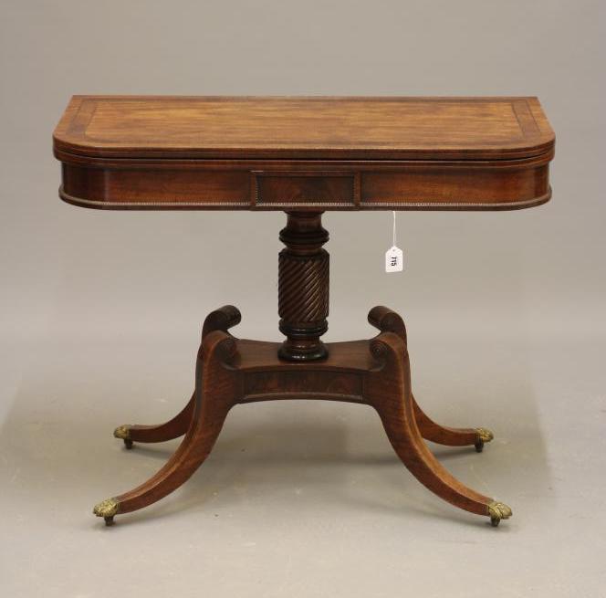 A REGENCY MAHOGANY FOLDING TEA TABLE Image