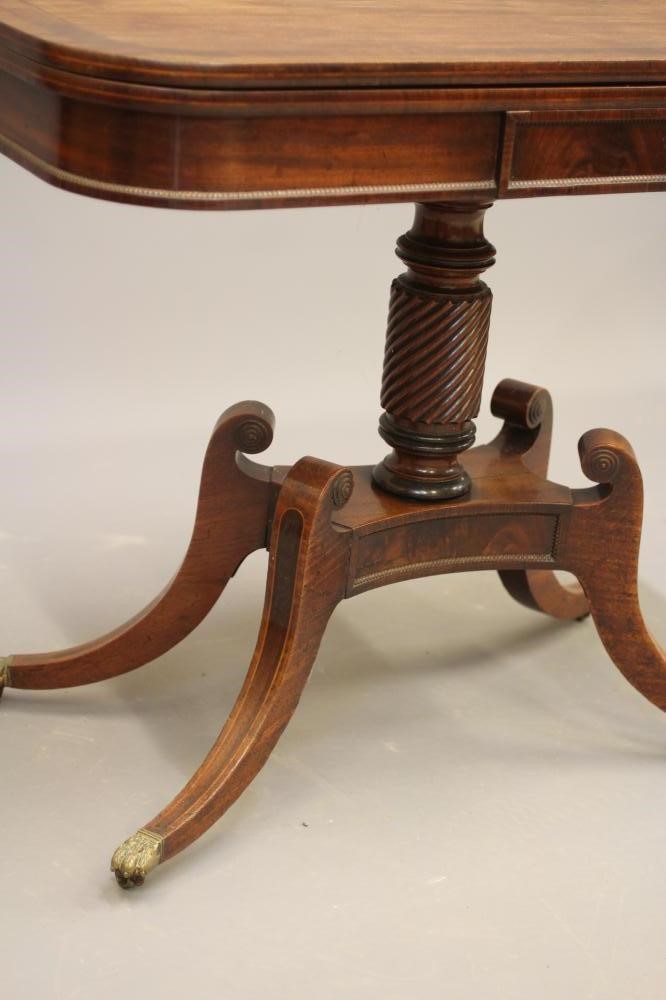 A REGENCY MAHOGANY FOLDING TEA TABLE Image